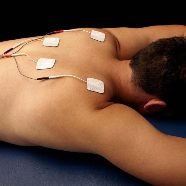 Patient receiving electrical muscle stimulation