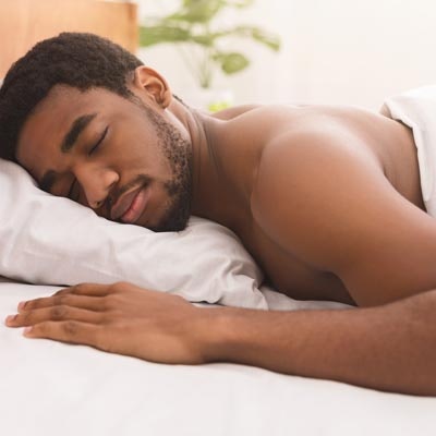 Man sleeping on stomach