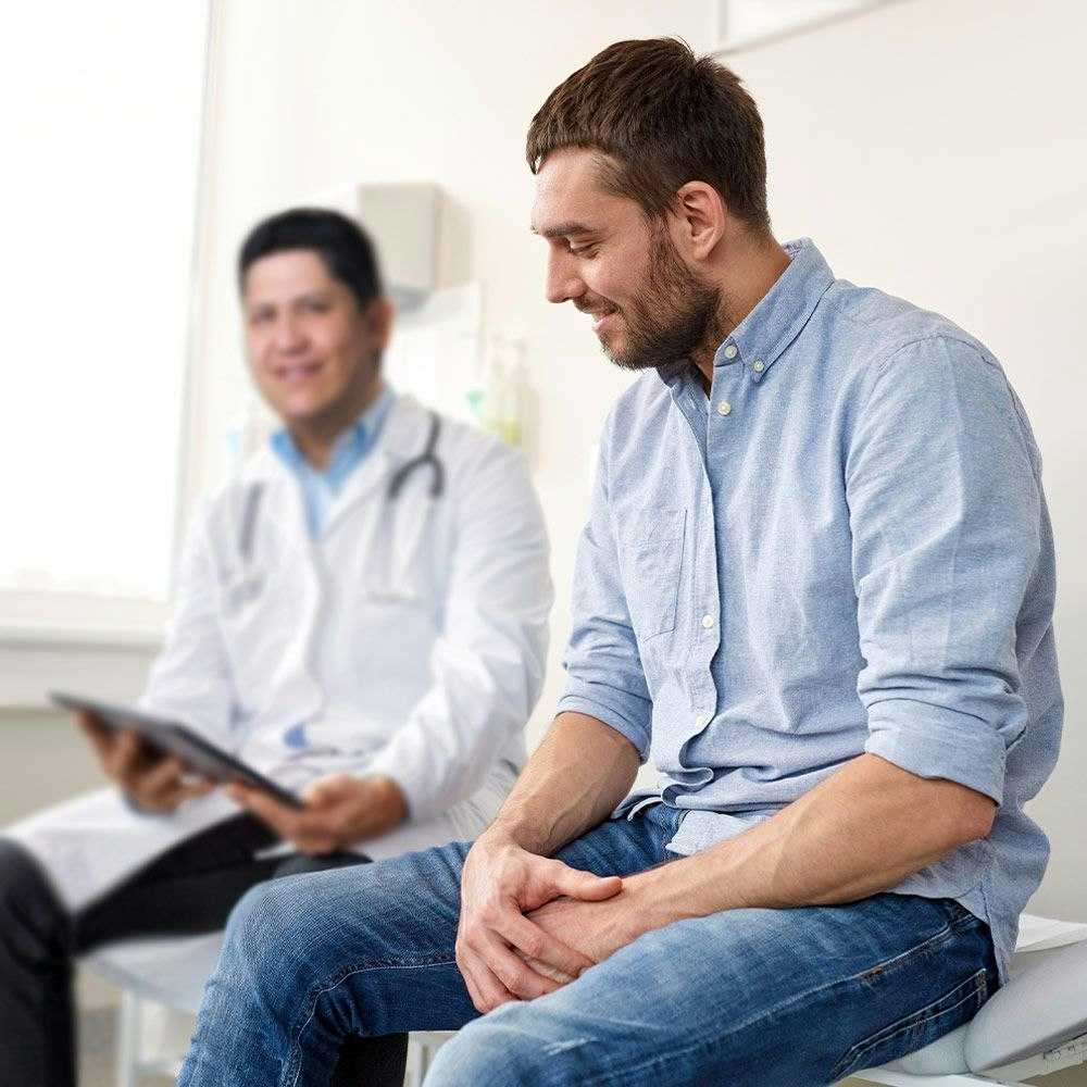 Man talking with a doctor