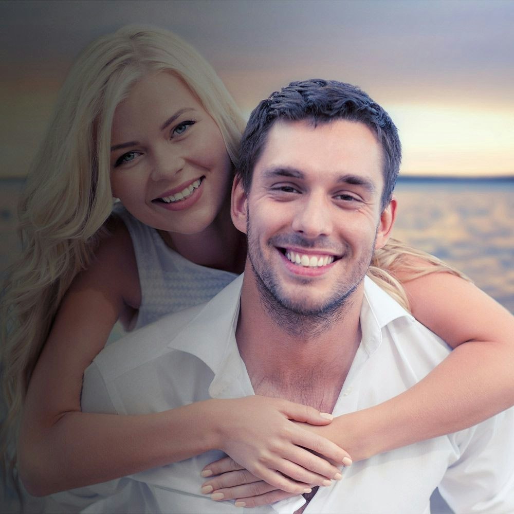 Woman embracing man from behind