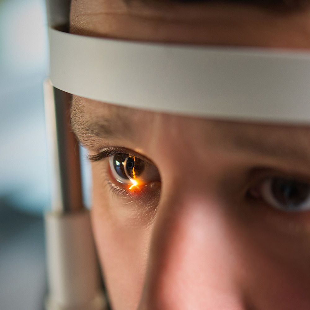 Patient undergoing slit lamp exam