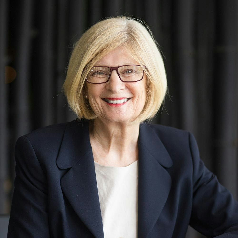 Older business woman smiling