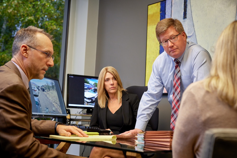 Attorneys Matthew Quick, Elizabeth Quick, and Brad Fulton