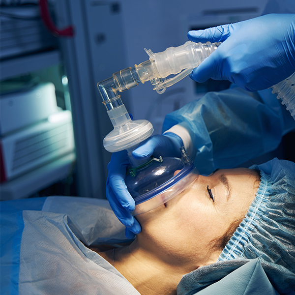 Woman receiving general anesthesia