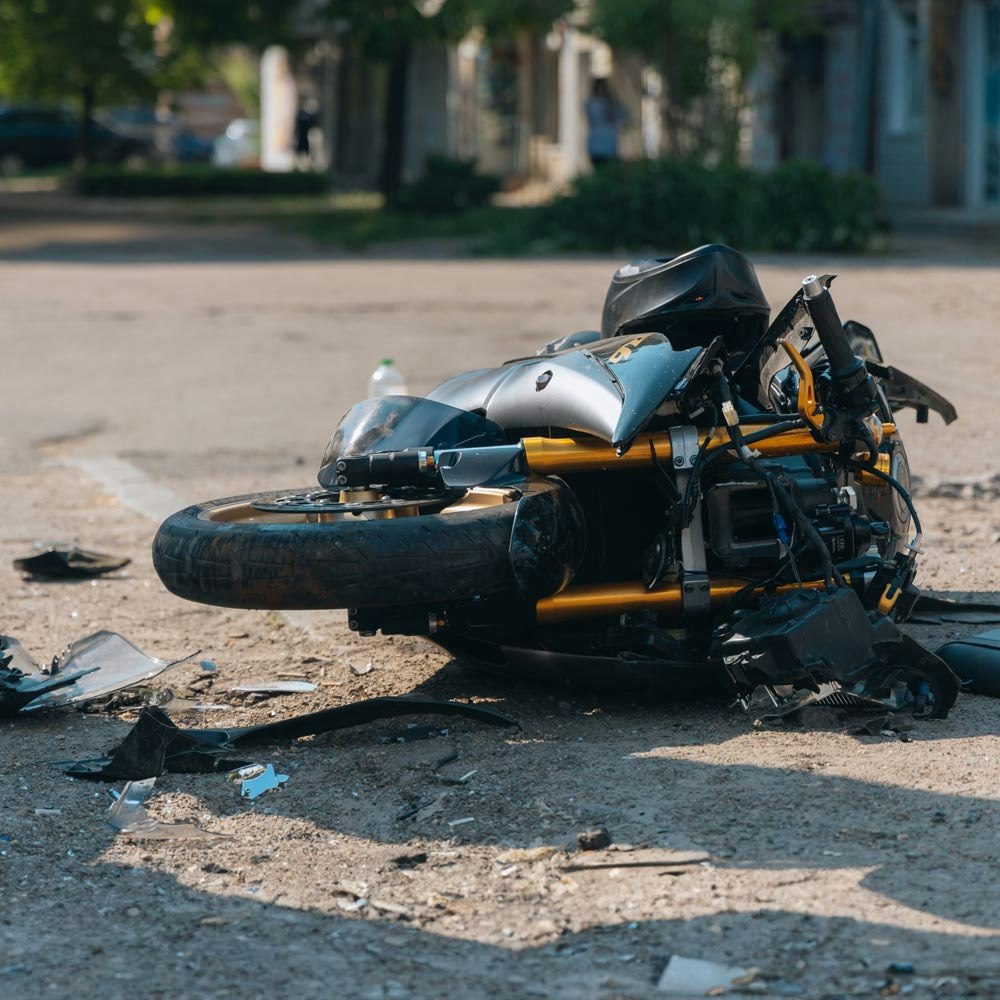 fallen motorcycle after accident