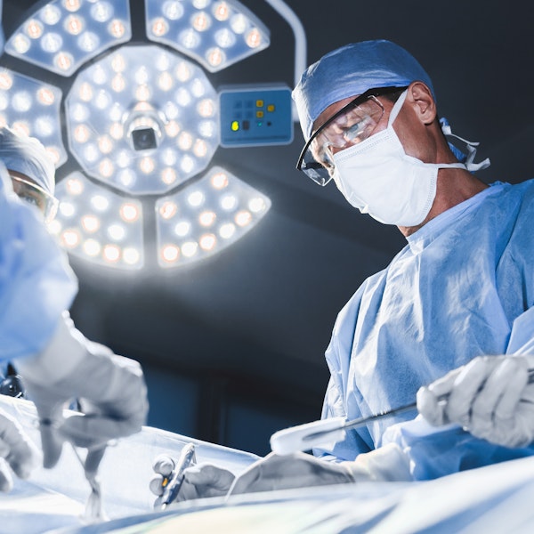 Surgeons performing surgery
