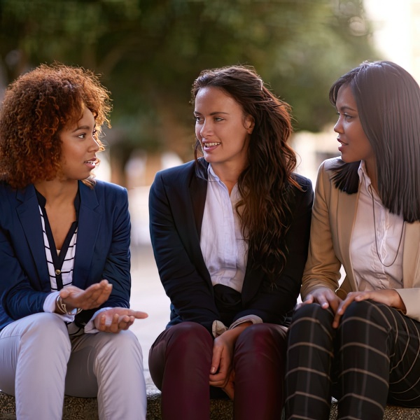 Woman talking to friends after a car accident