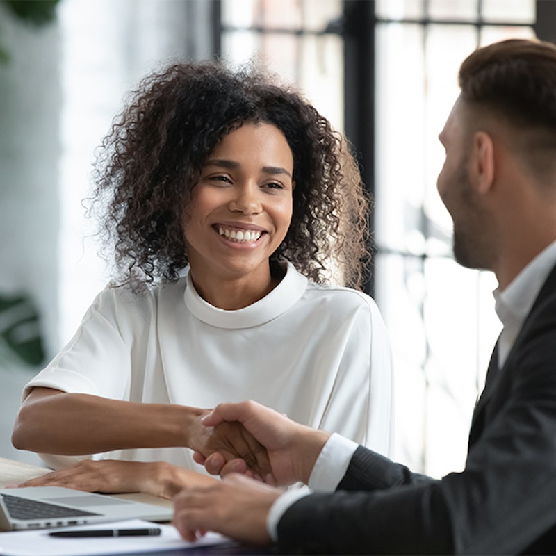 coworkers shaking hands