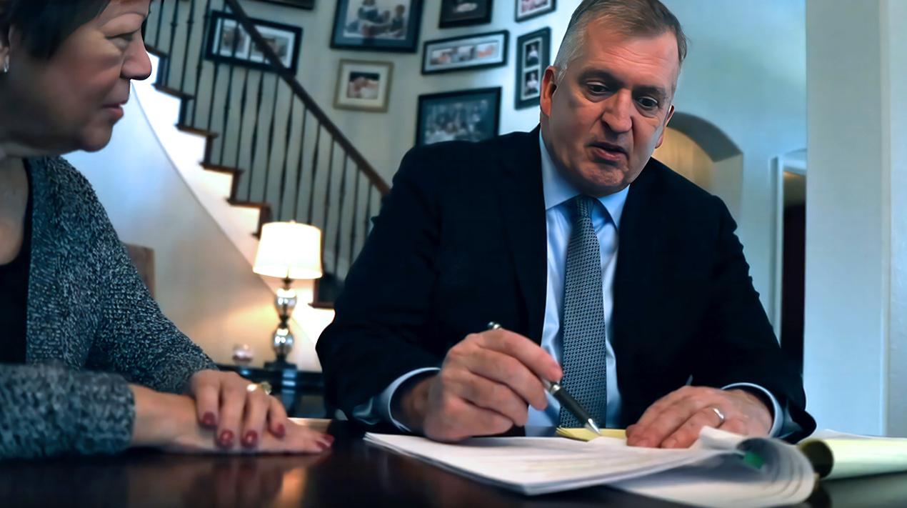 Mr. Atkerson meeting with a client