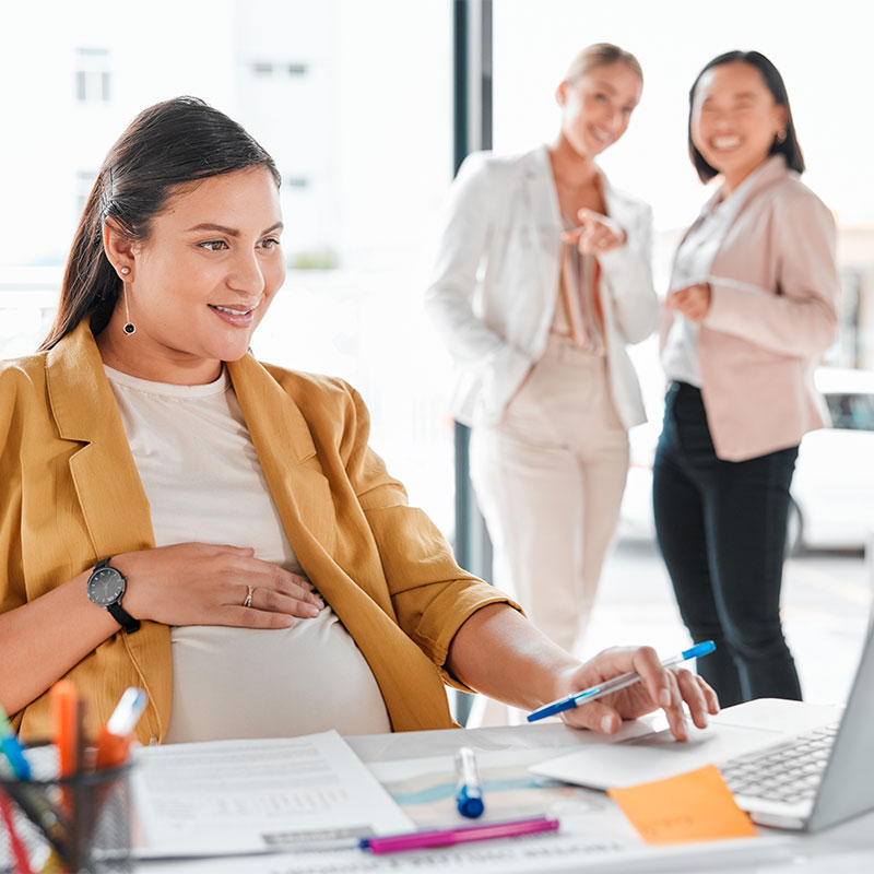 Coworkers talking about pregnant coworker