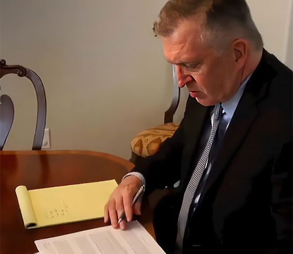 Dan Atkerson reviewing evidence