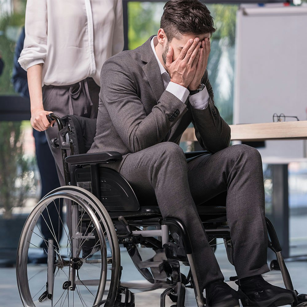 Man being discriminated at work due to disability