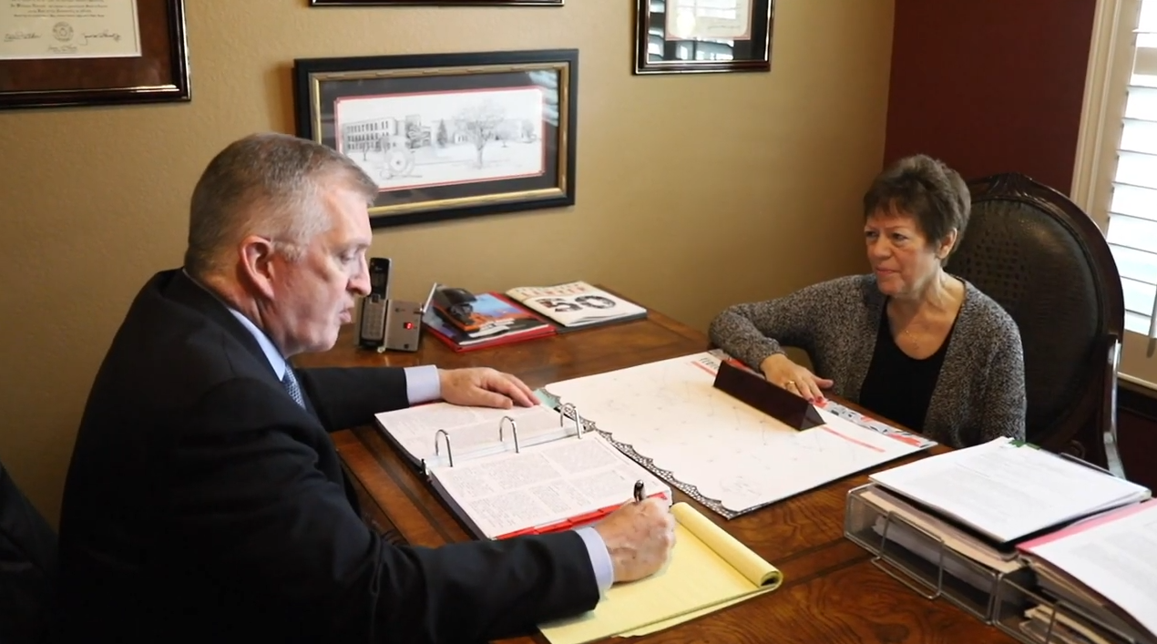 attorney dan atkerson consulting with client