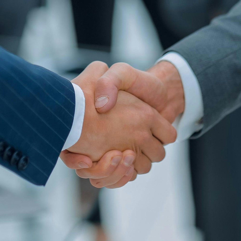 lawyer shaking hands with client