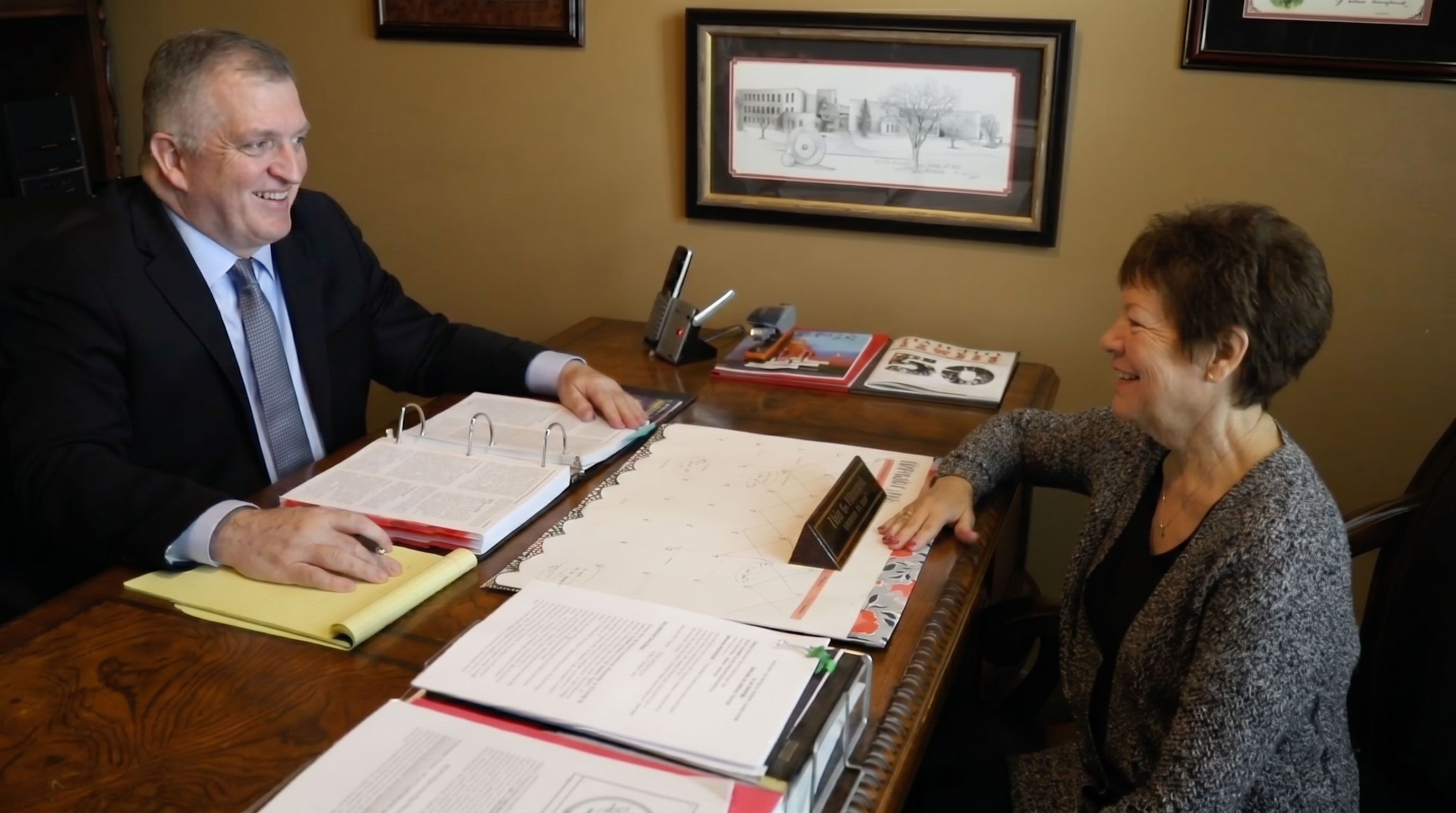 Dan A. Atkerson speaking with client