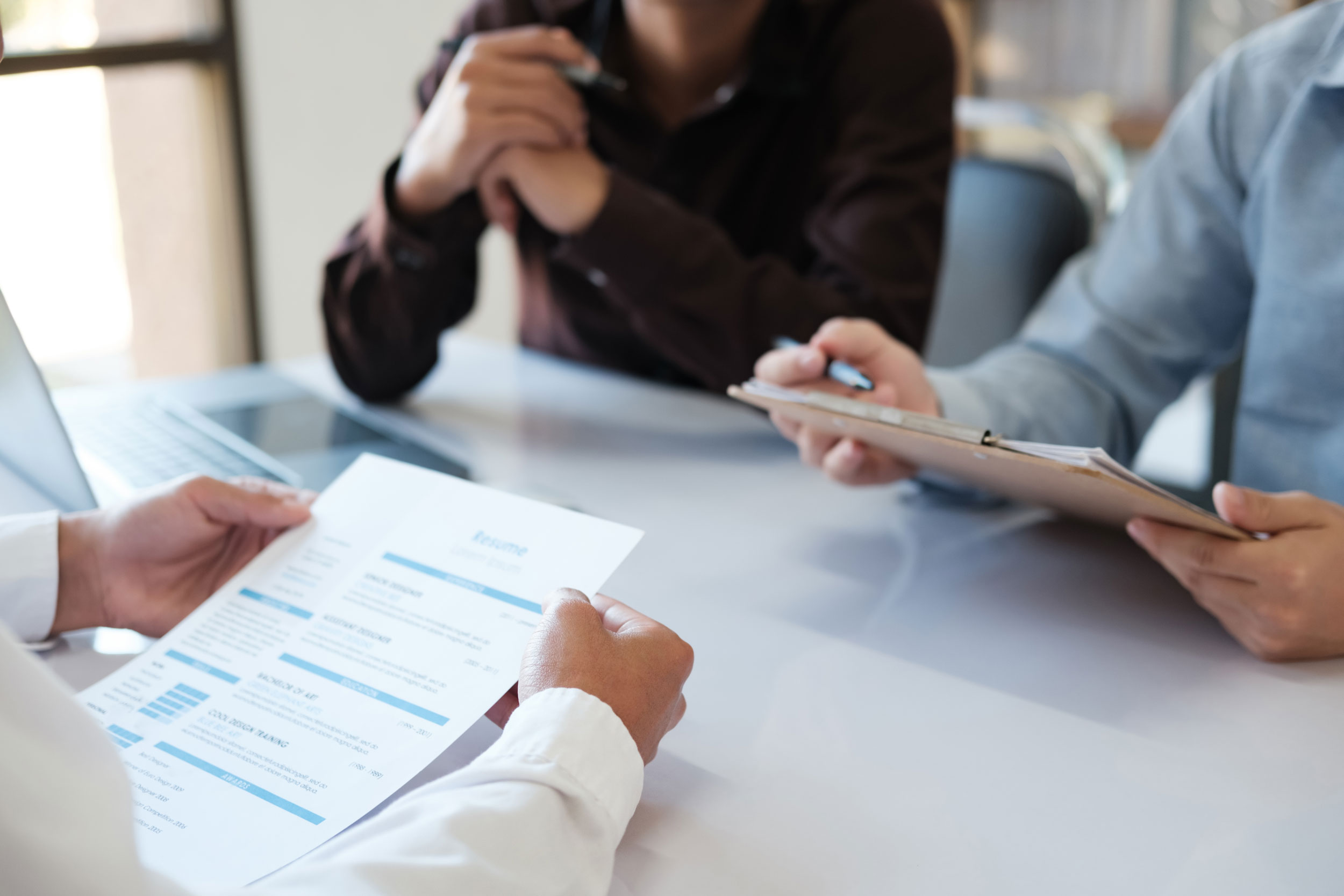 Group of people reviewing paperwork