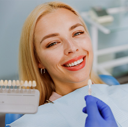 Patient Receiving Stainless Steel Veneer Treatment