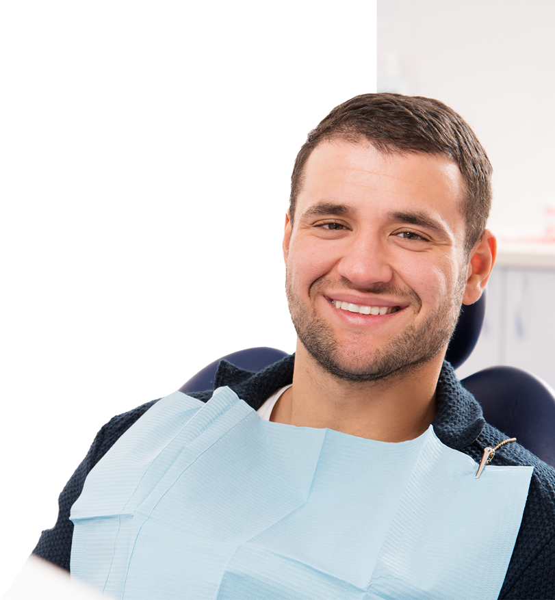 smiling patient in a dental chair