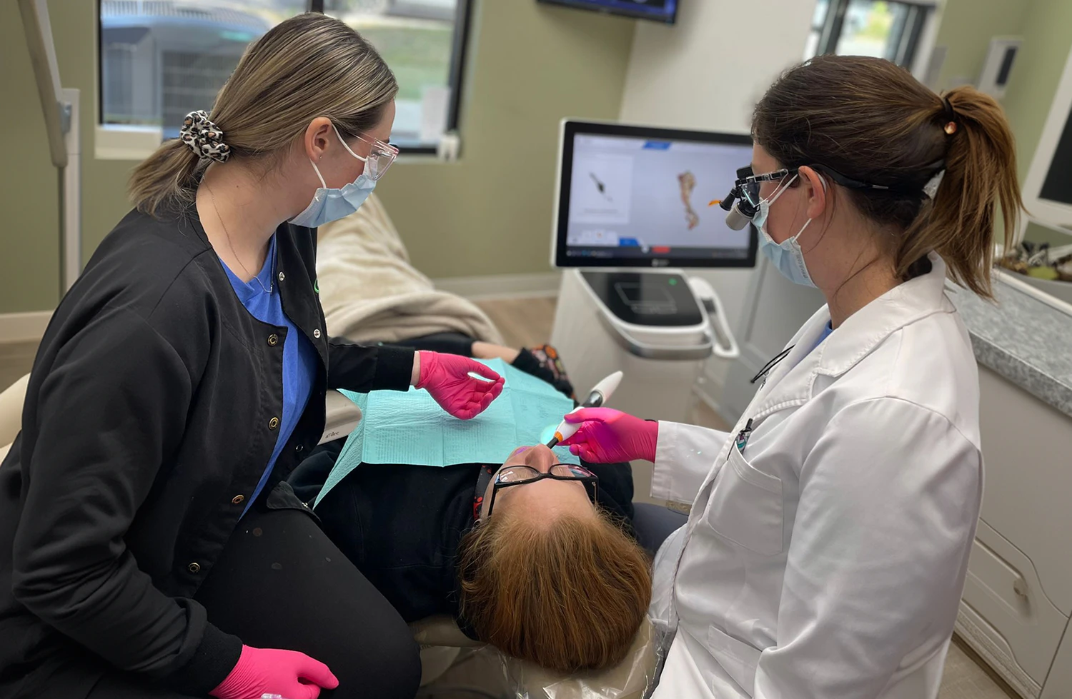 Dental team working on patient