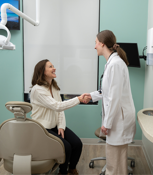 Dentist with patient