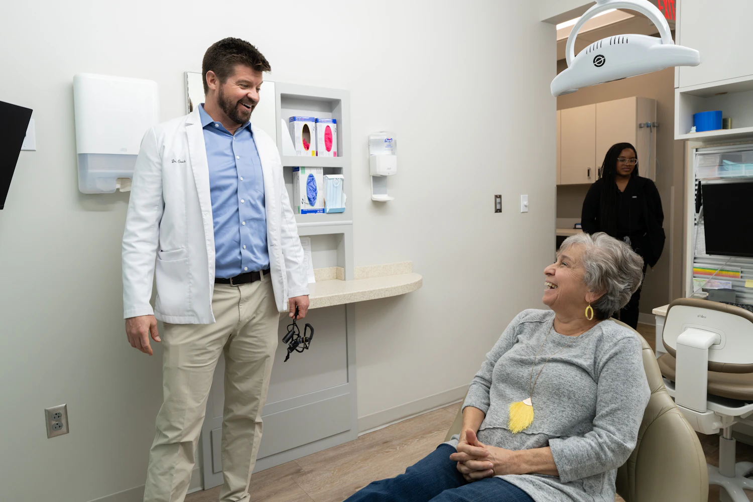 Dentist with patient