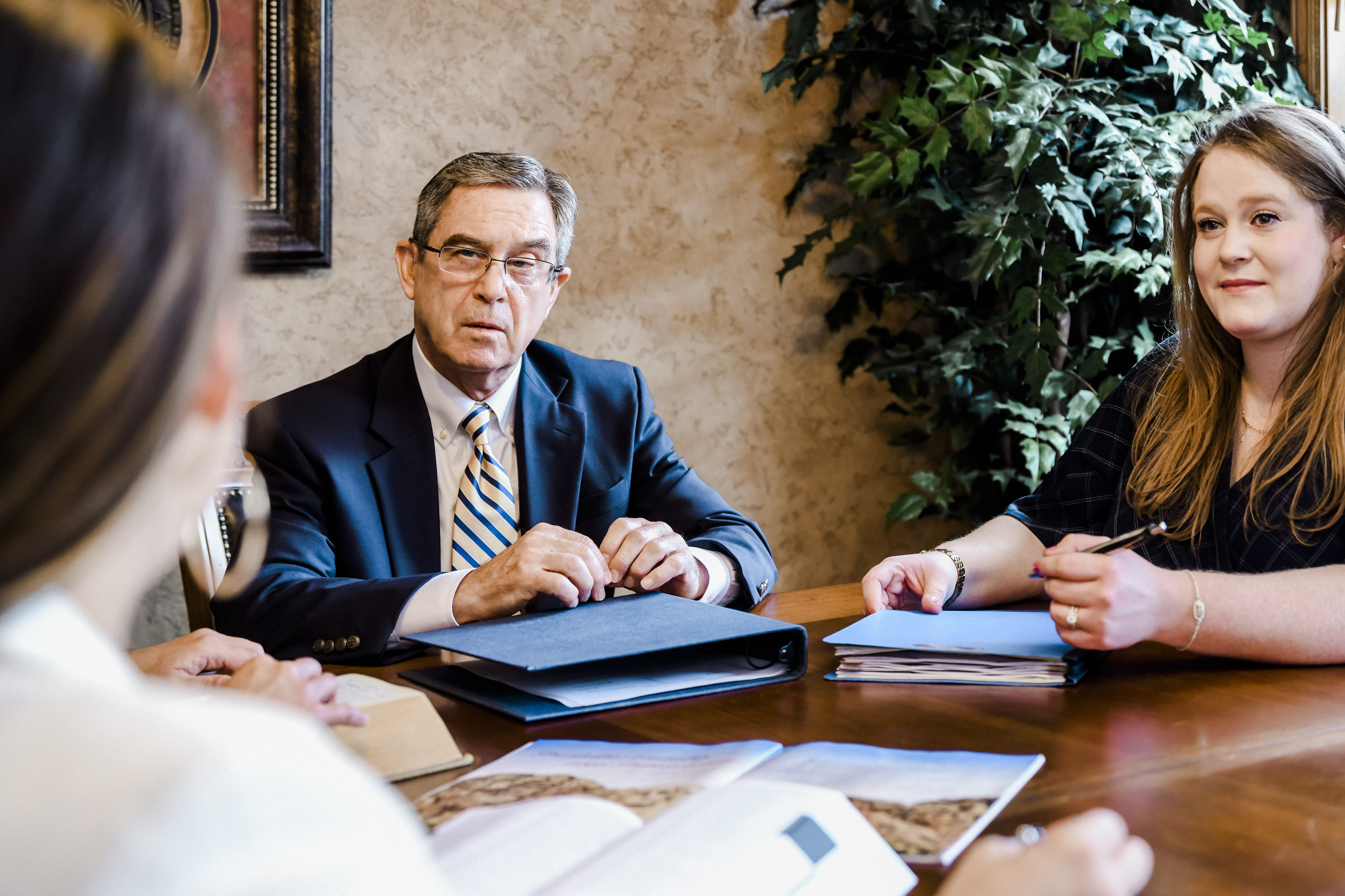 Client talking to lawyers