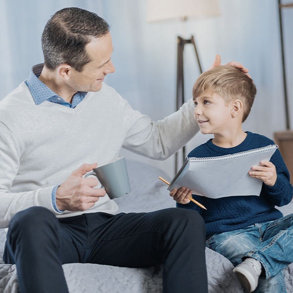 Caregiver and young boy