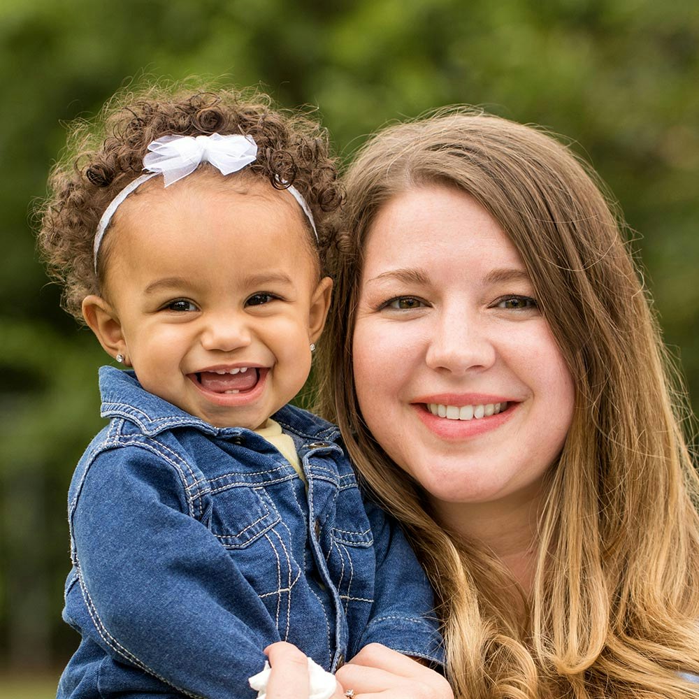 Smiling mother and baby