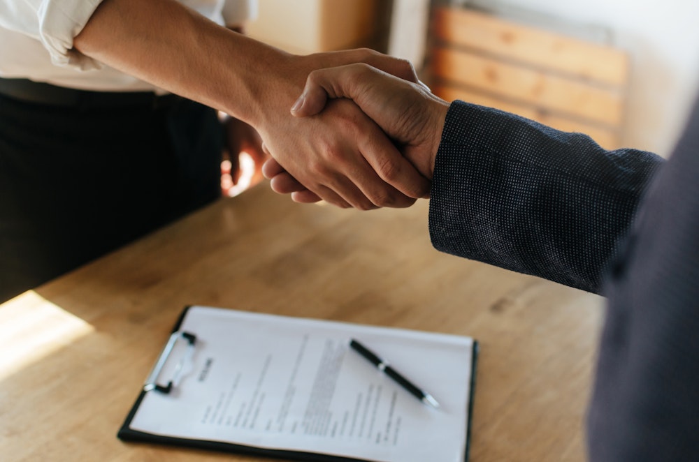 handshake over a contract