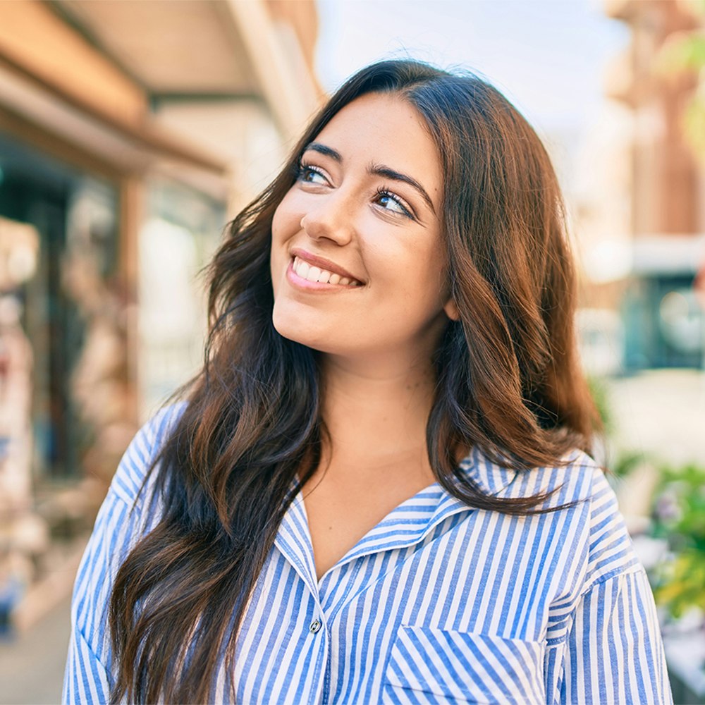 Young hispanic woman smiling