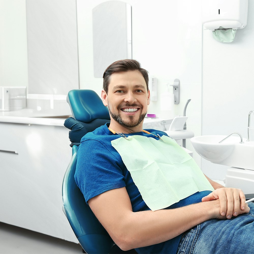Man smiling at the dentist