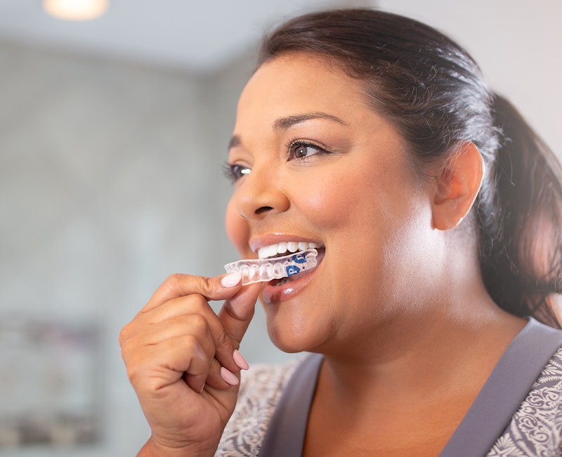 a woman using Perio-Protect