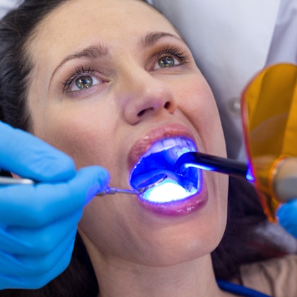woman receiving dental treatment
