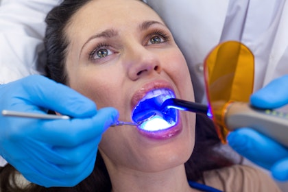 woman receiving dental treatment