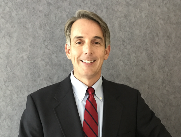 Dr. Zavell conducting a consultation with a female patient