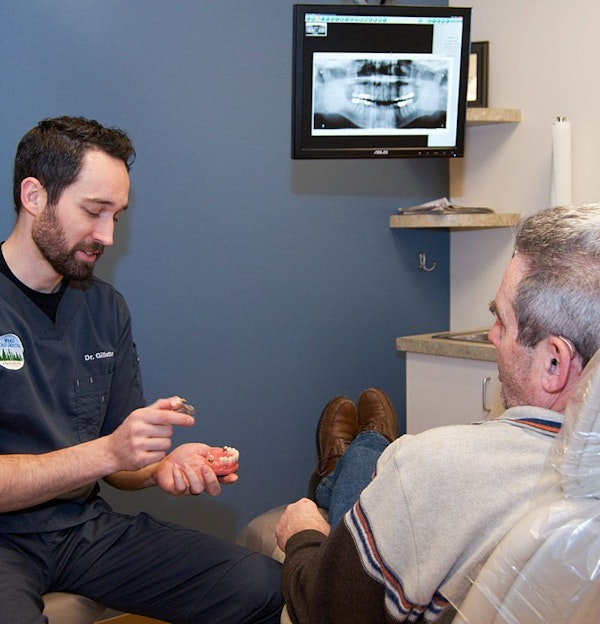 Dr. gillette speaks to his patient