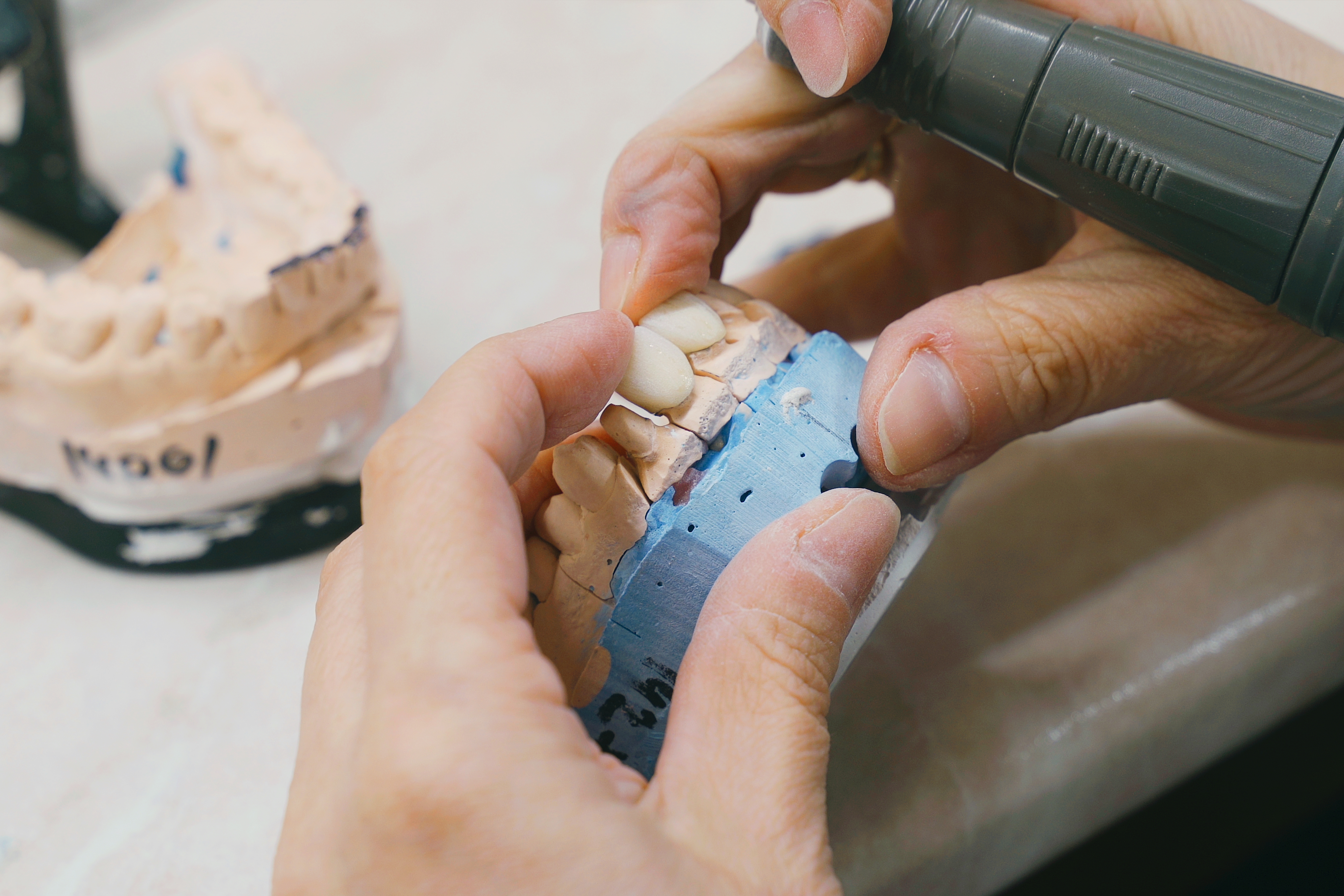 Person working on creating dentures