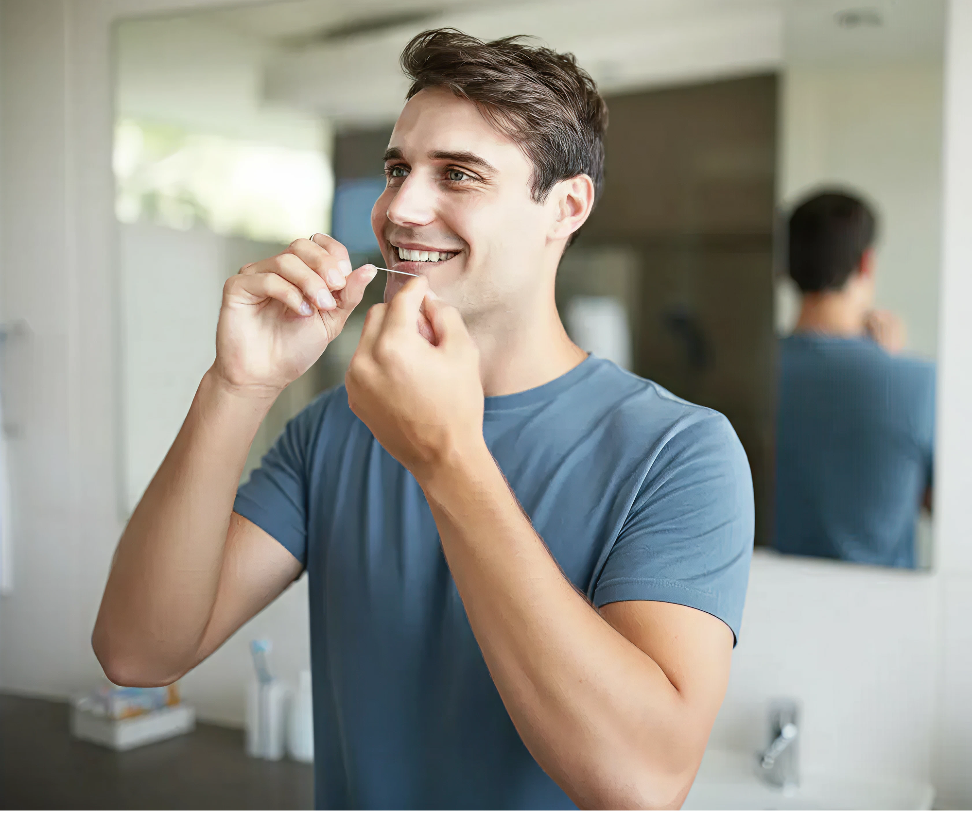man flossing