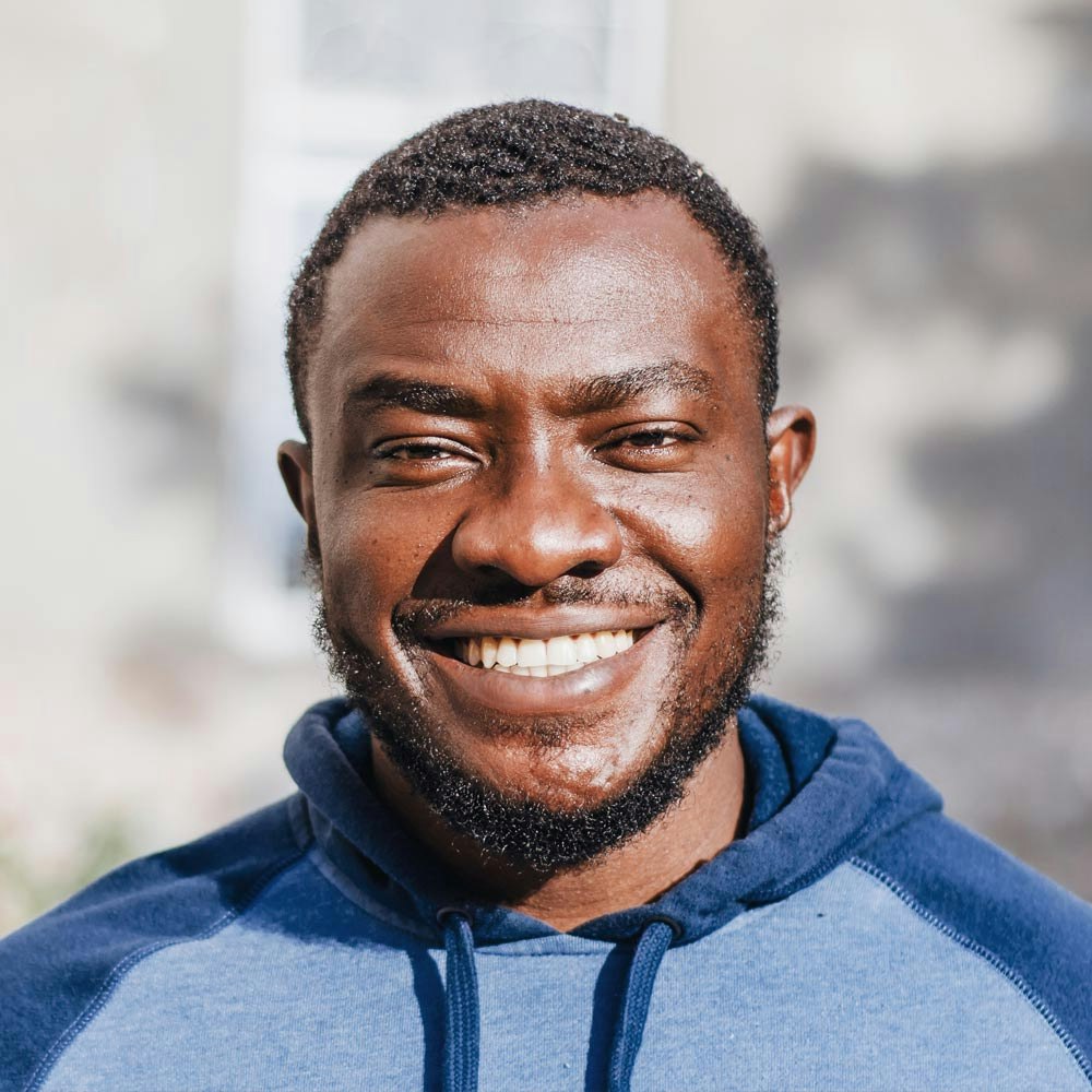 Man smiling with dental crowns