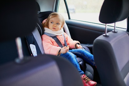 toddler girl in carseat