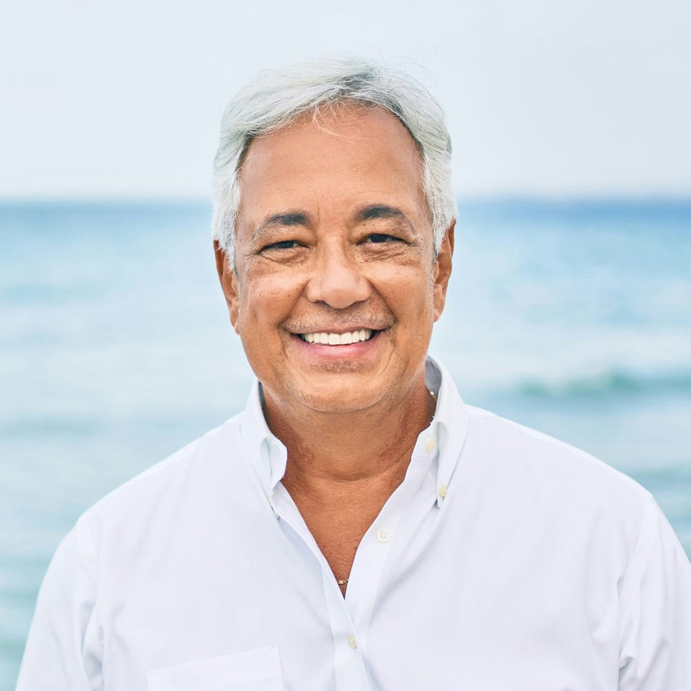 Smiling mature man at the beach