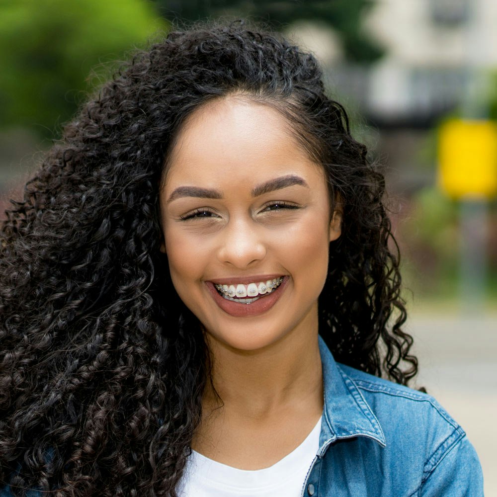 Smiling woman with braces