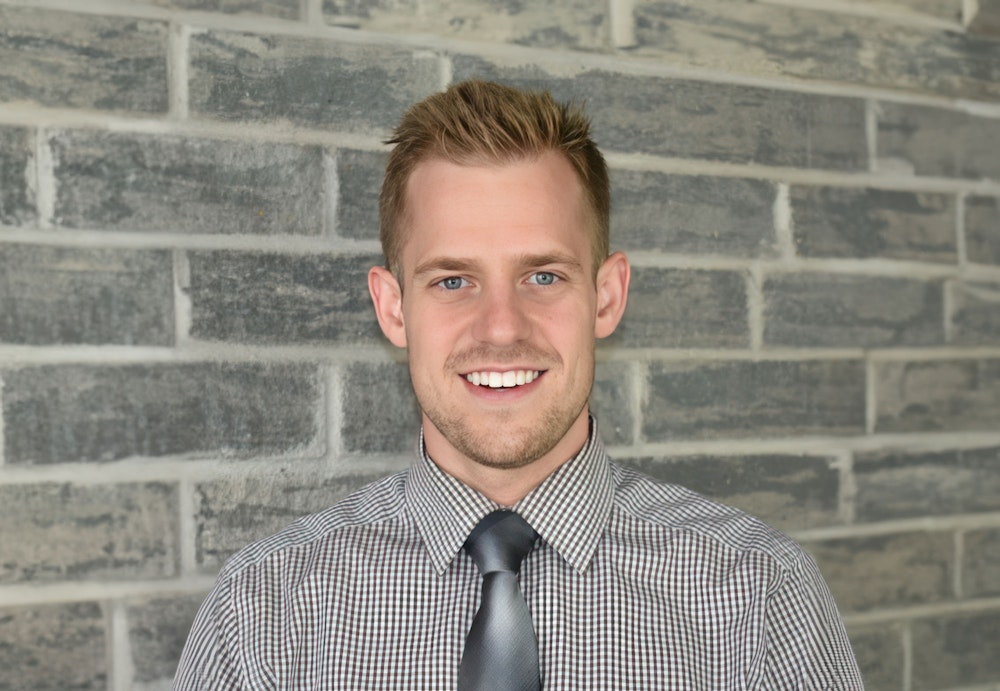 headshot of Dr. Ray, our Orthodontist in San Antonio