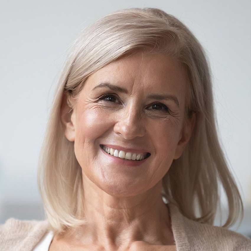 An older woman with a healthy smile