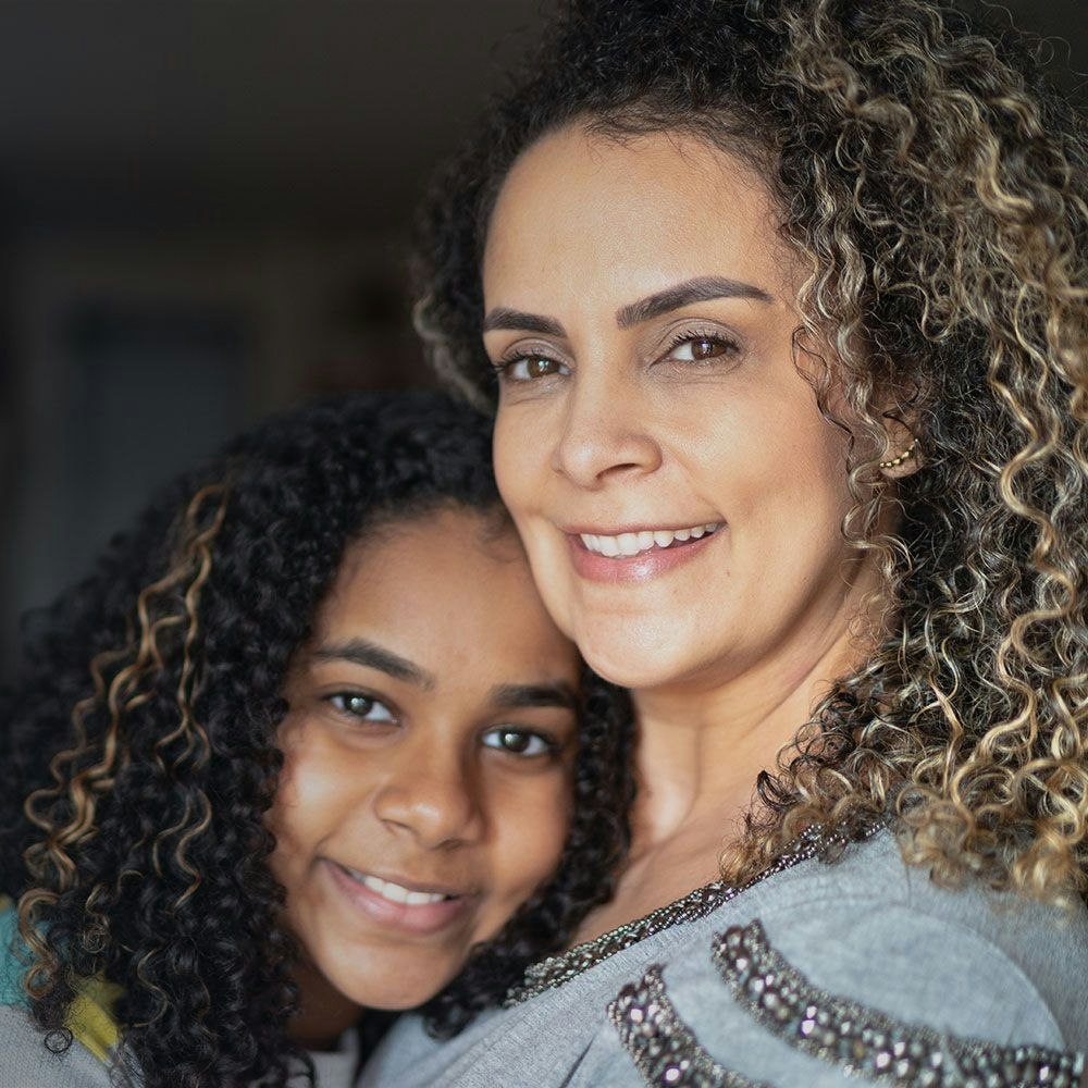 A mother holding her daughter