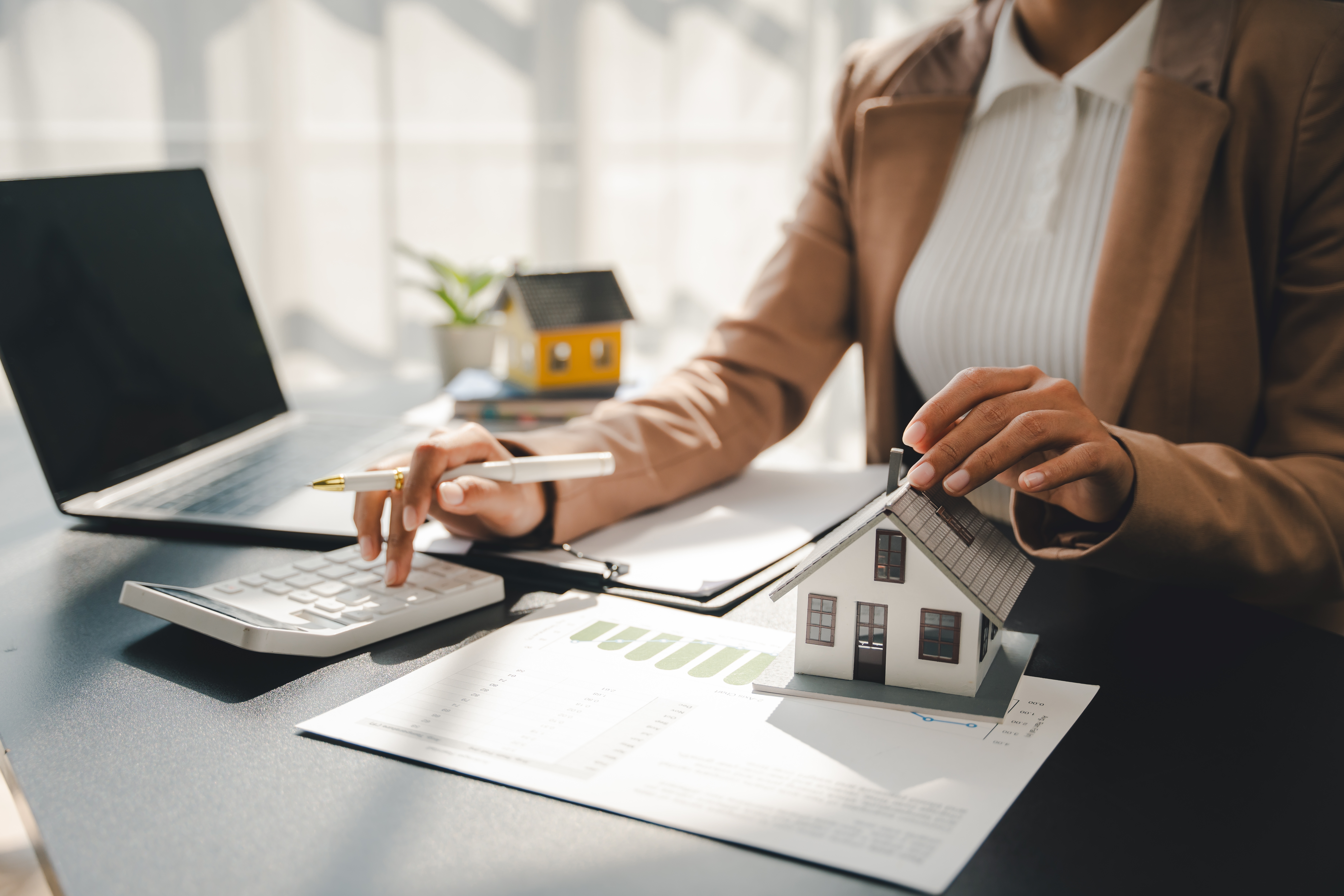 Person at a desk working on finances