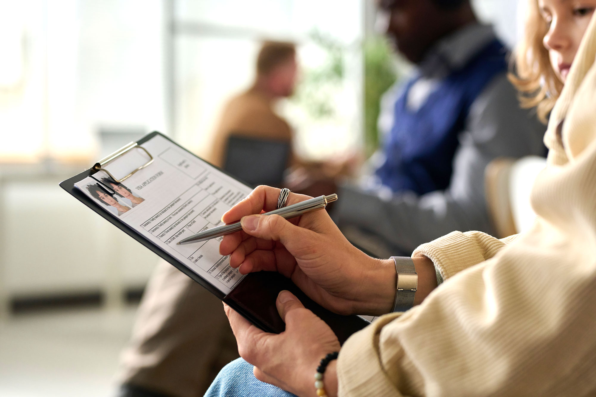 Woman filling out adoption paperwork
