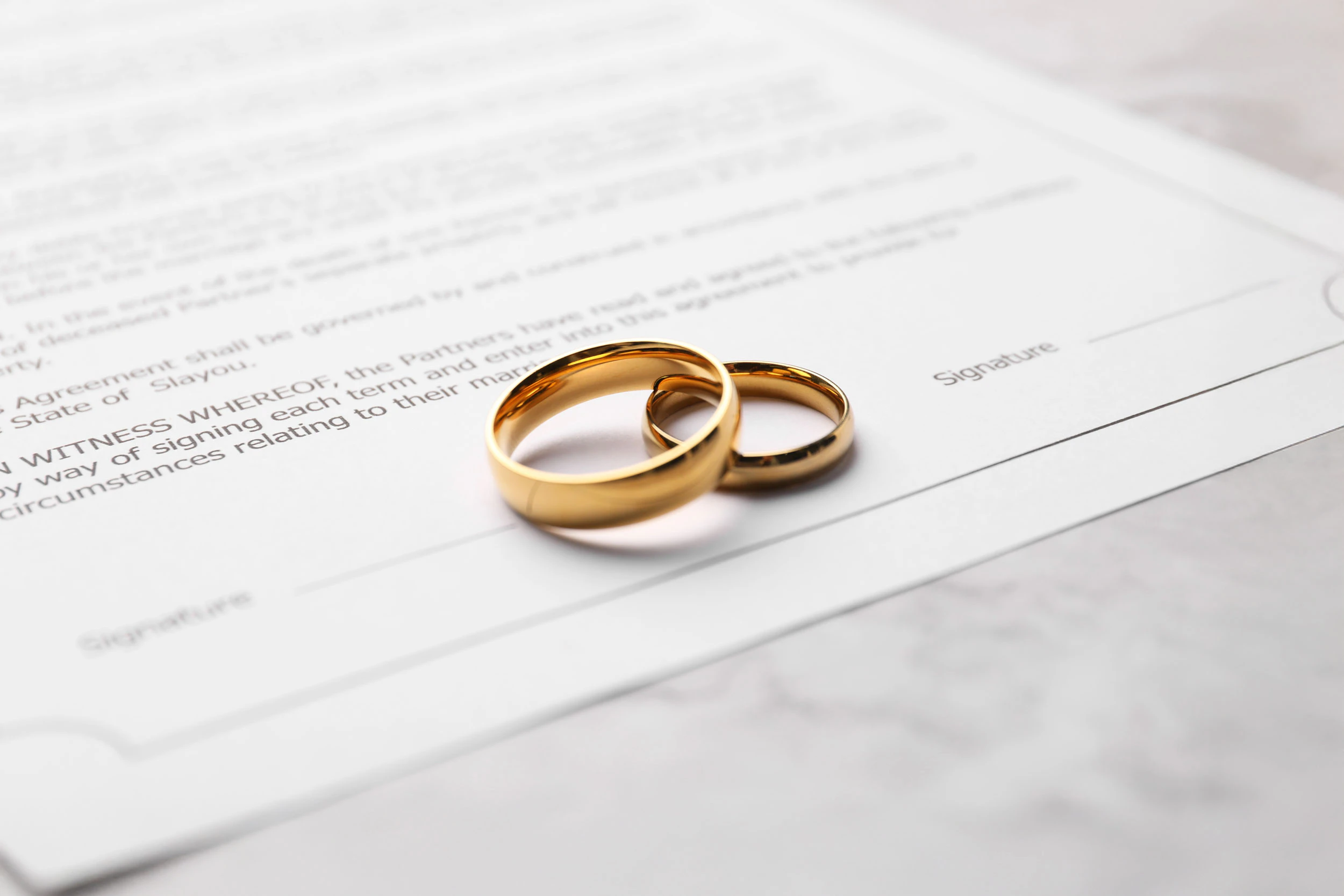 rings on wedding certificate