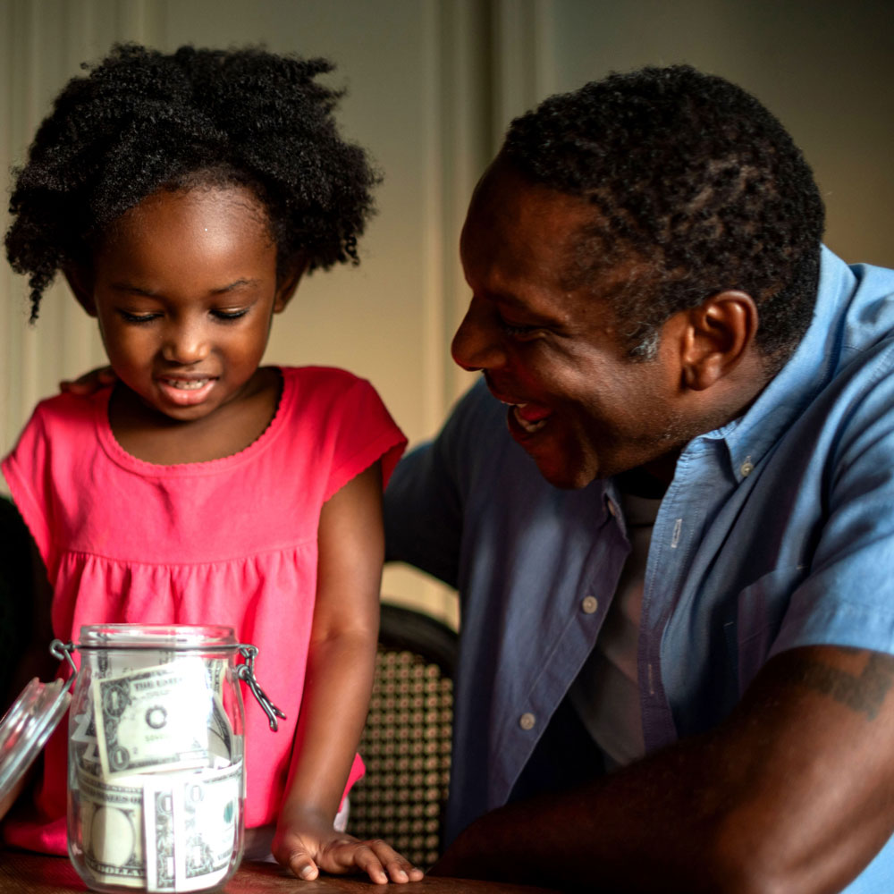 Man talking with little girl