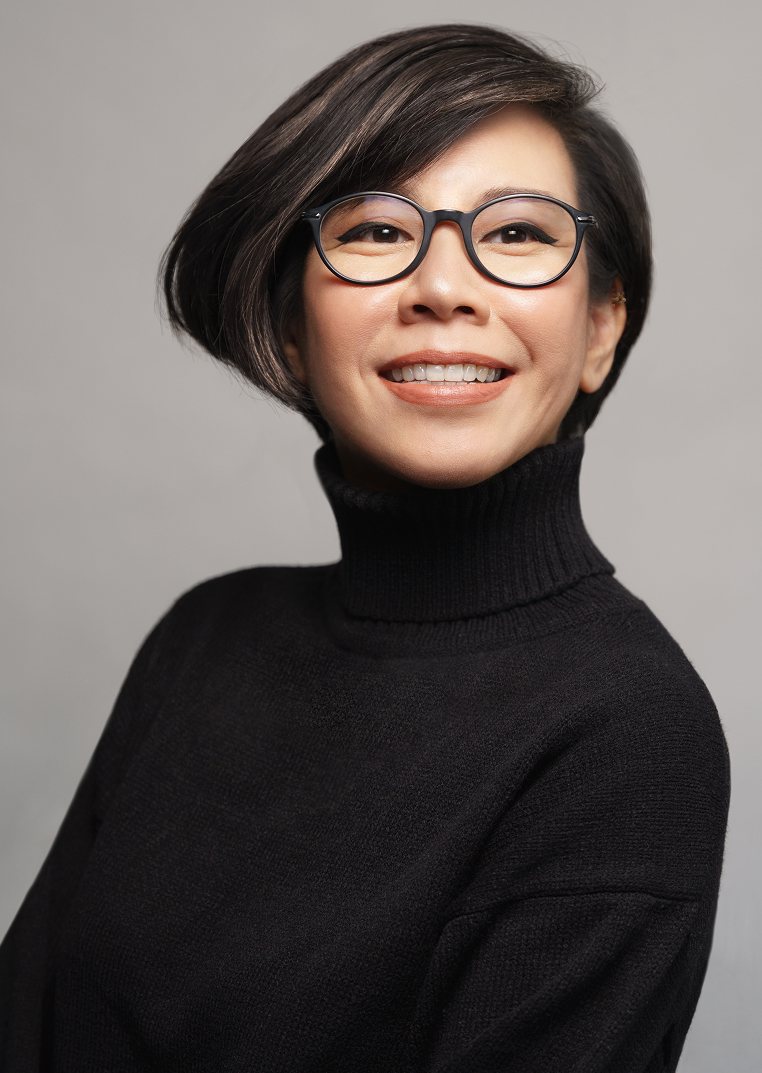 smiling woman in turtleneck